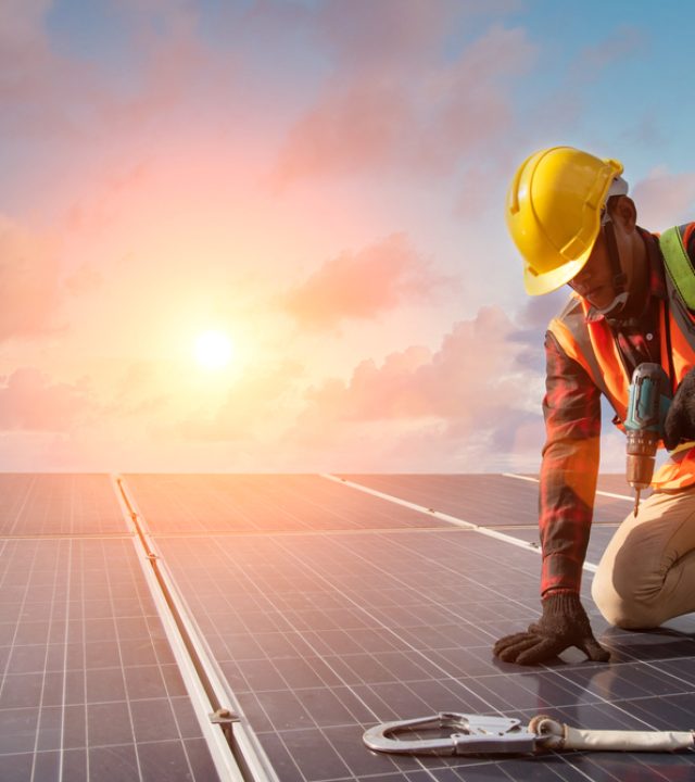 Solar,Cell,A,Man,Working,At,Solar,Power,Station,Installing